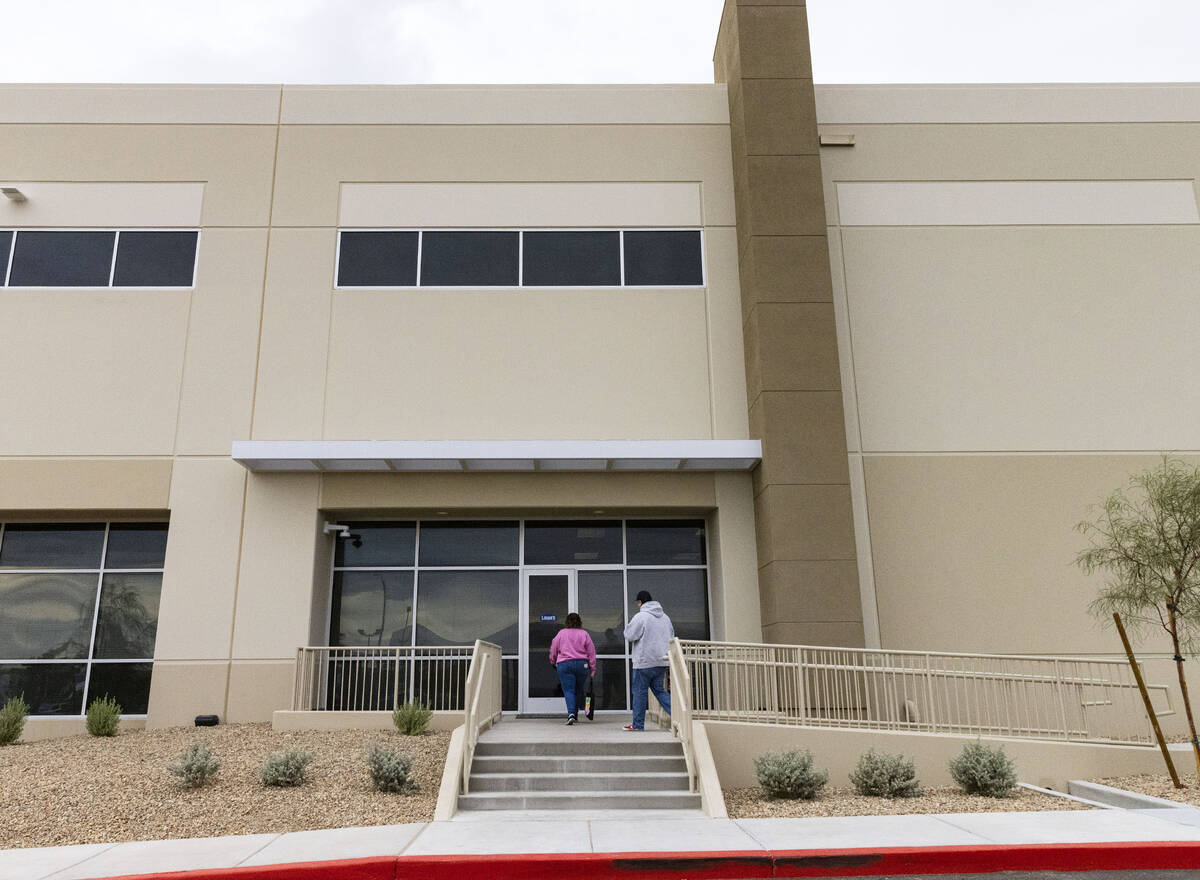 People enter the building at the SunPoint West, a newly built industrial park, is shown on Wedn ...