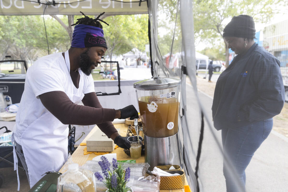Myles Bunch, owner of a plant-based food business called The Edible Bunch, serves a lemonade fo ...