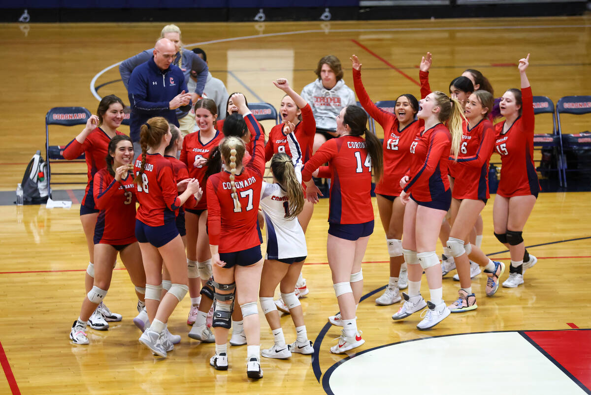 Coronado players celebrate after defeating Shadow Ridge in a volleyball game at Coronado High S ...