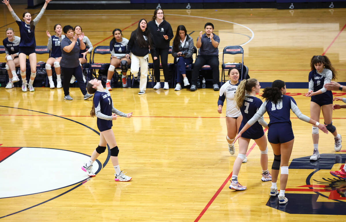 Shadow Ridge players celebrate after a play against Coronado during a volleyball game at Corona ...