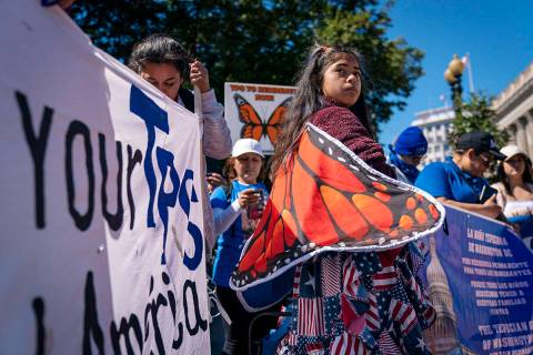 Marilyn Miranda, 12, of Washington, protests for an extension of the Temporary Protected Status ...