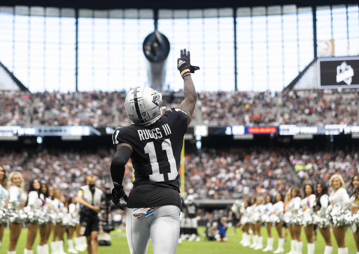 Raiders wide receiver Henry Ruggs III (11) takes the field before the start of an NFL football ...