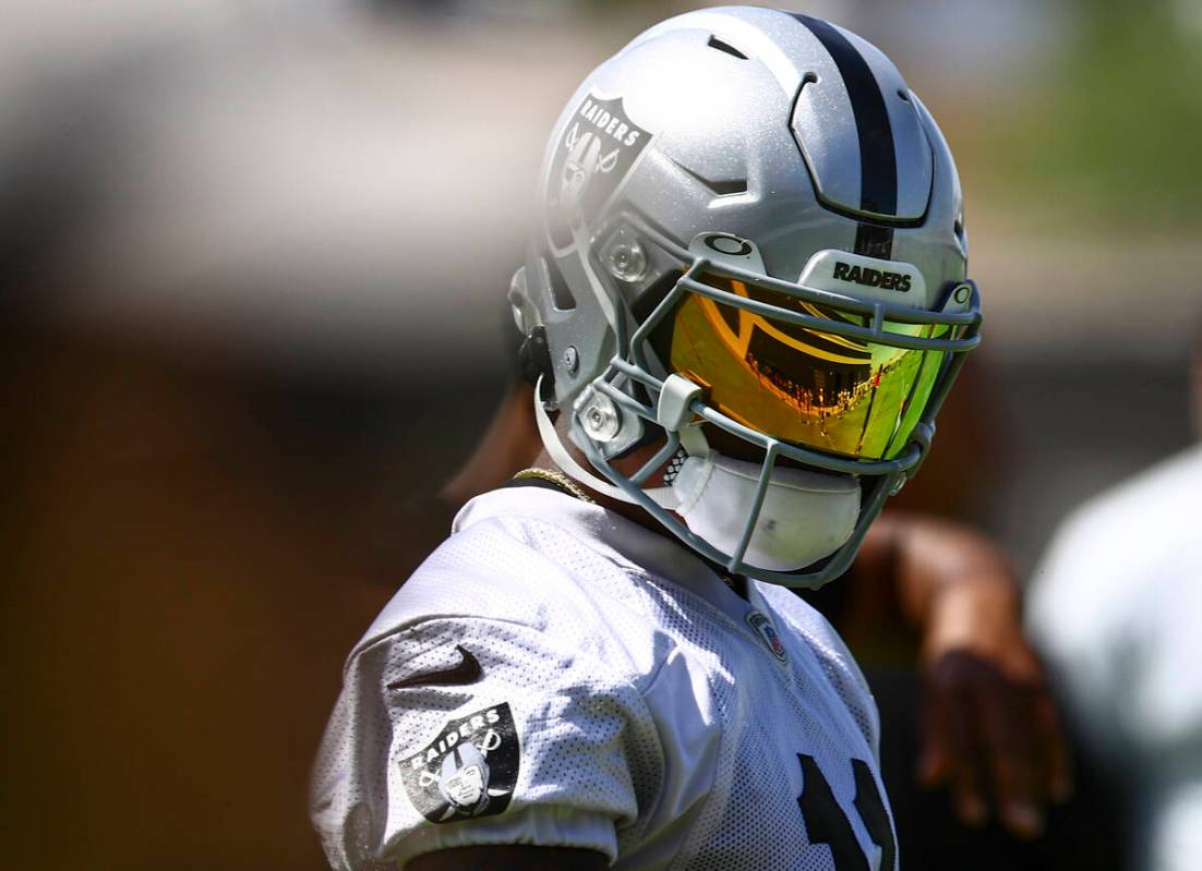 Raiders wide receiver Henry Ruggs III looks on during NFL football practice at Raiders headquar ...