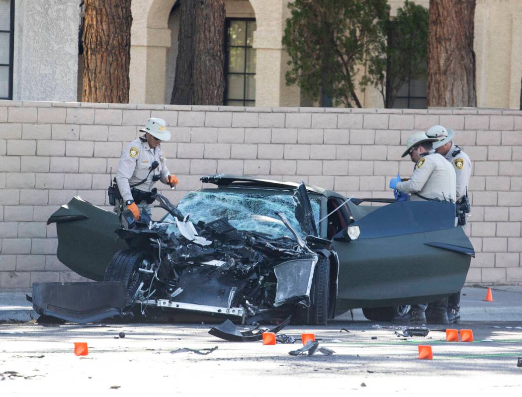 Las Vegas Metropolitan Police Department investigates a fatal crash near South Rainbow Boulevar ...