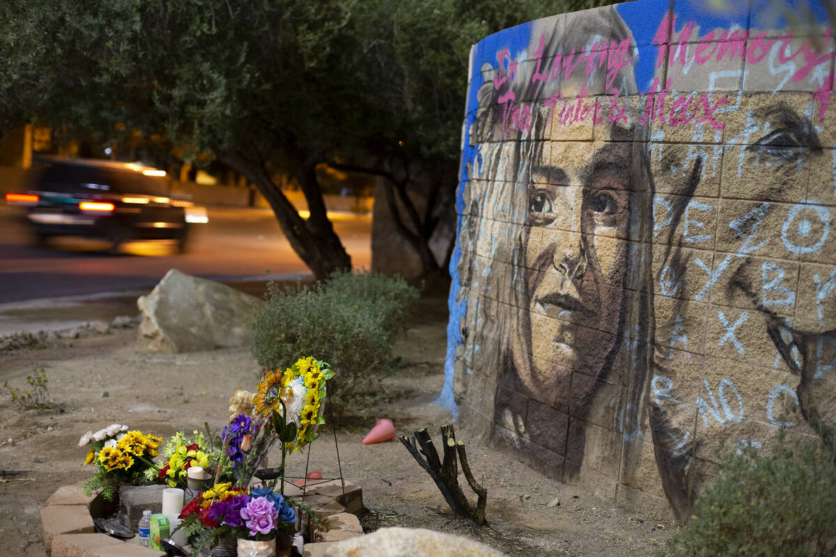 A mural of Tina Tintor and her dog Max, who were killed in a car crash involving an NFL player, ...