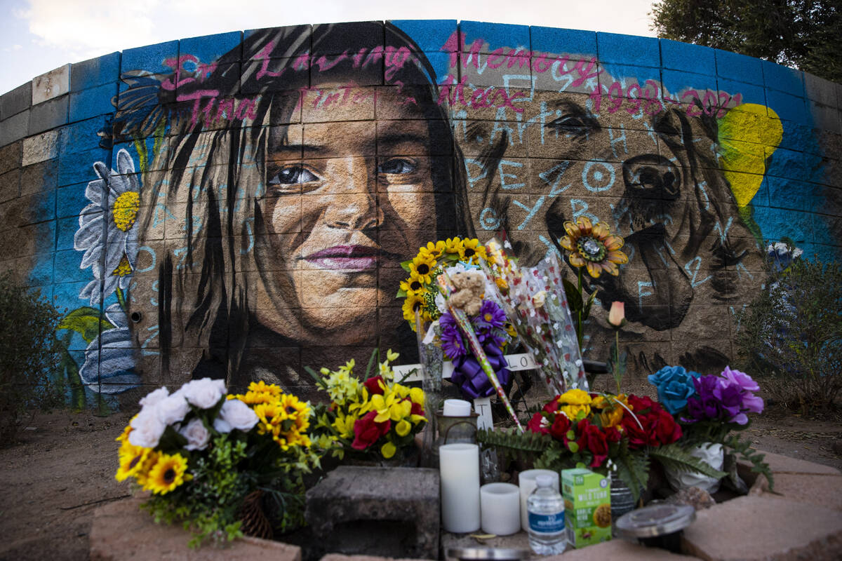 A mural painted in memory of Tina Tintor and her dog Max, who were killed in a car crash involv ...