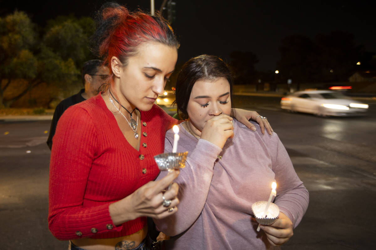 Valentina Astalos, left, and Sanja Jagrovic, attend a vigil for their childhood friend Tina Tin ...