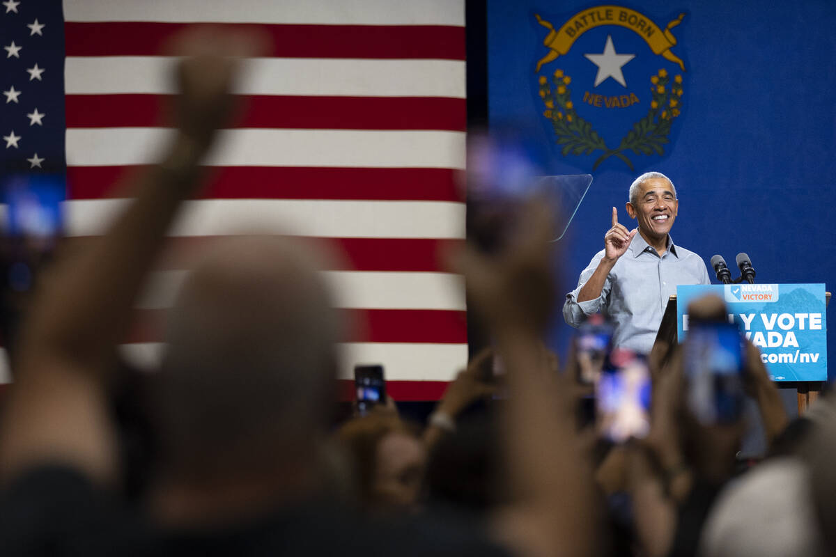 Former President Barack Obama speaks during a campaign rally organized by Nevada Democratic Vic ...