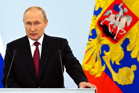 FILE - Russian President Vladimir Putin speaks during celebrations marking the incorporation of ...