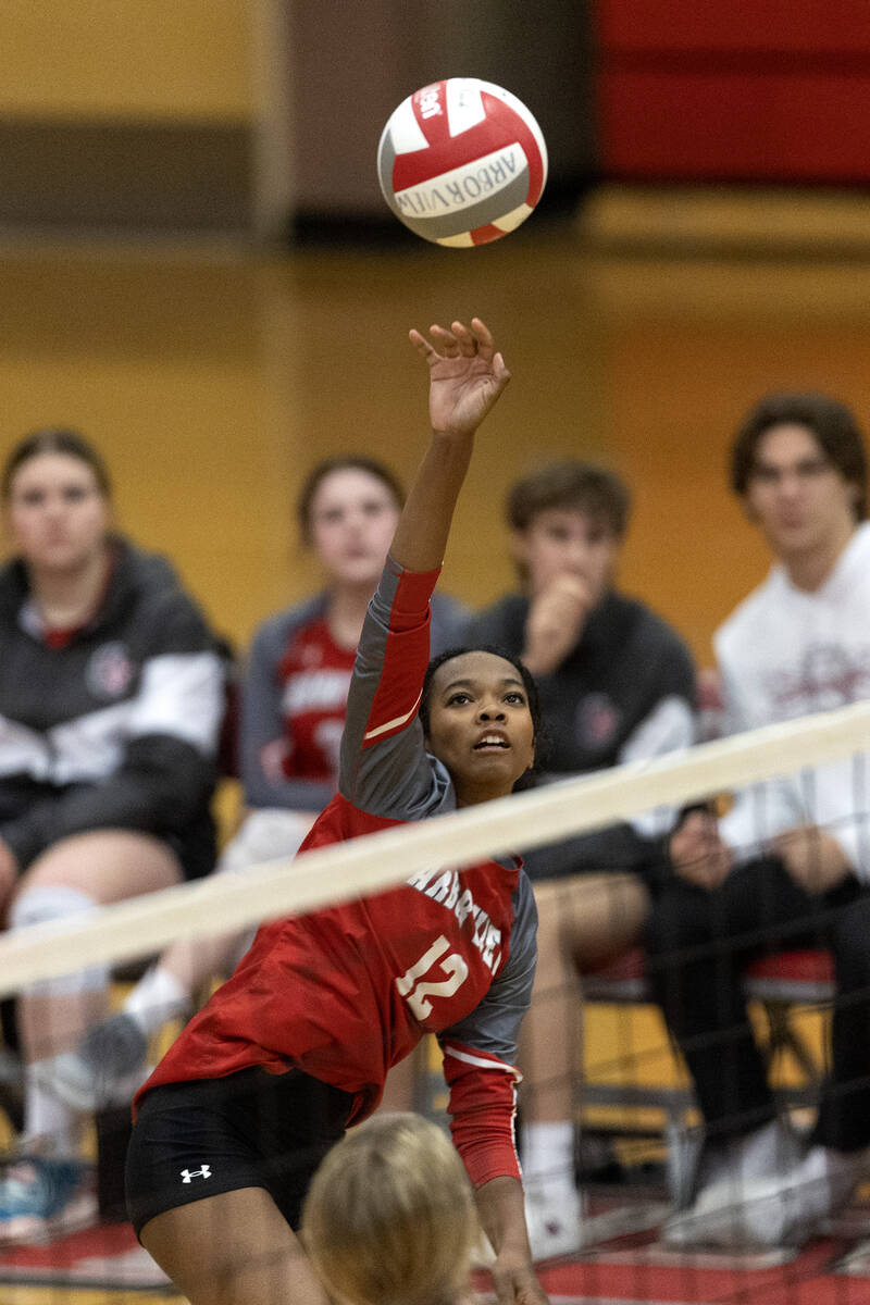 Arbor View’s Cameron Reese (12) spikes to Basic during a Class 4A girls state volleyball ...