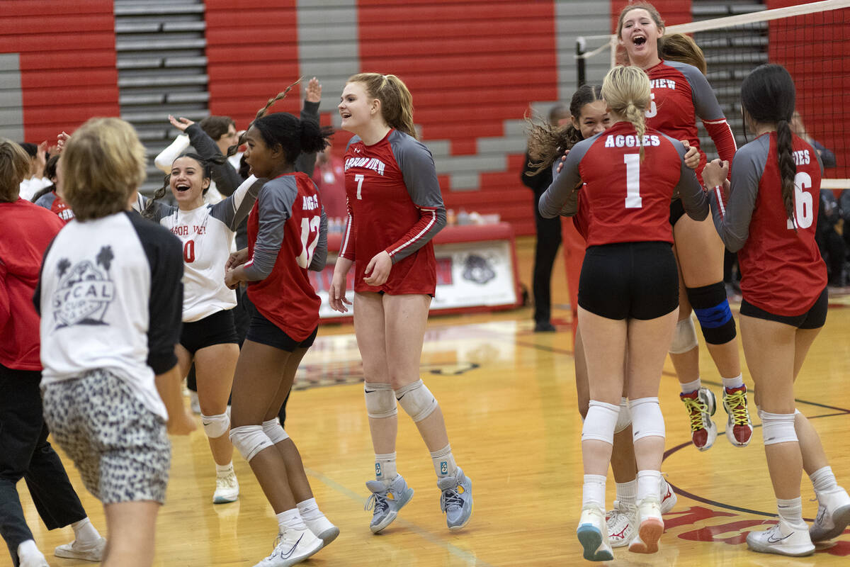 Arbor View celebrates after winning all three sets in a Class 4A girls state volleyball quarter ...