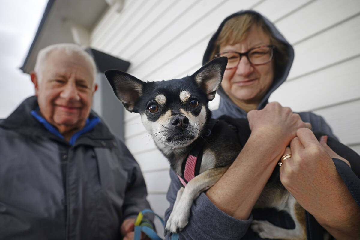 Ron Hack of Las Vegas waits in line to buy Powerball lottery tickets with his wife Peggy and th ...