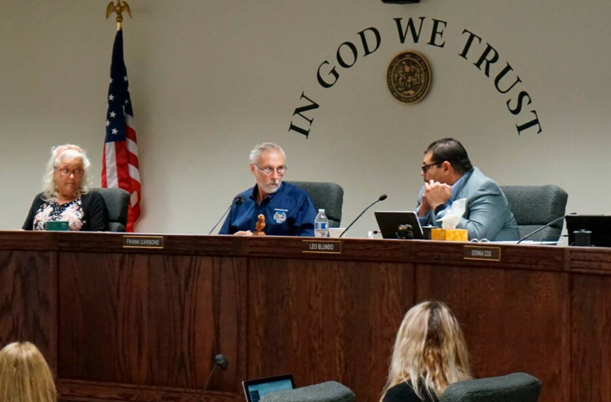 From left, Nye County Commissioners Debra Strickland, Frank Carbone and Leo Blundo discuss appo ...