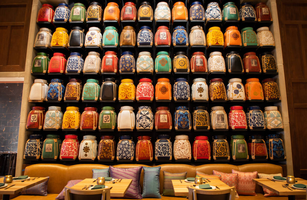 A display of traditional packs for harvesting tea in one of the dining rooms of the new Lotus o ...