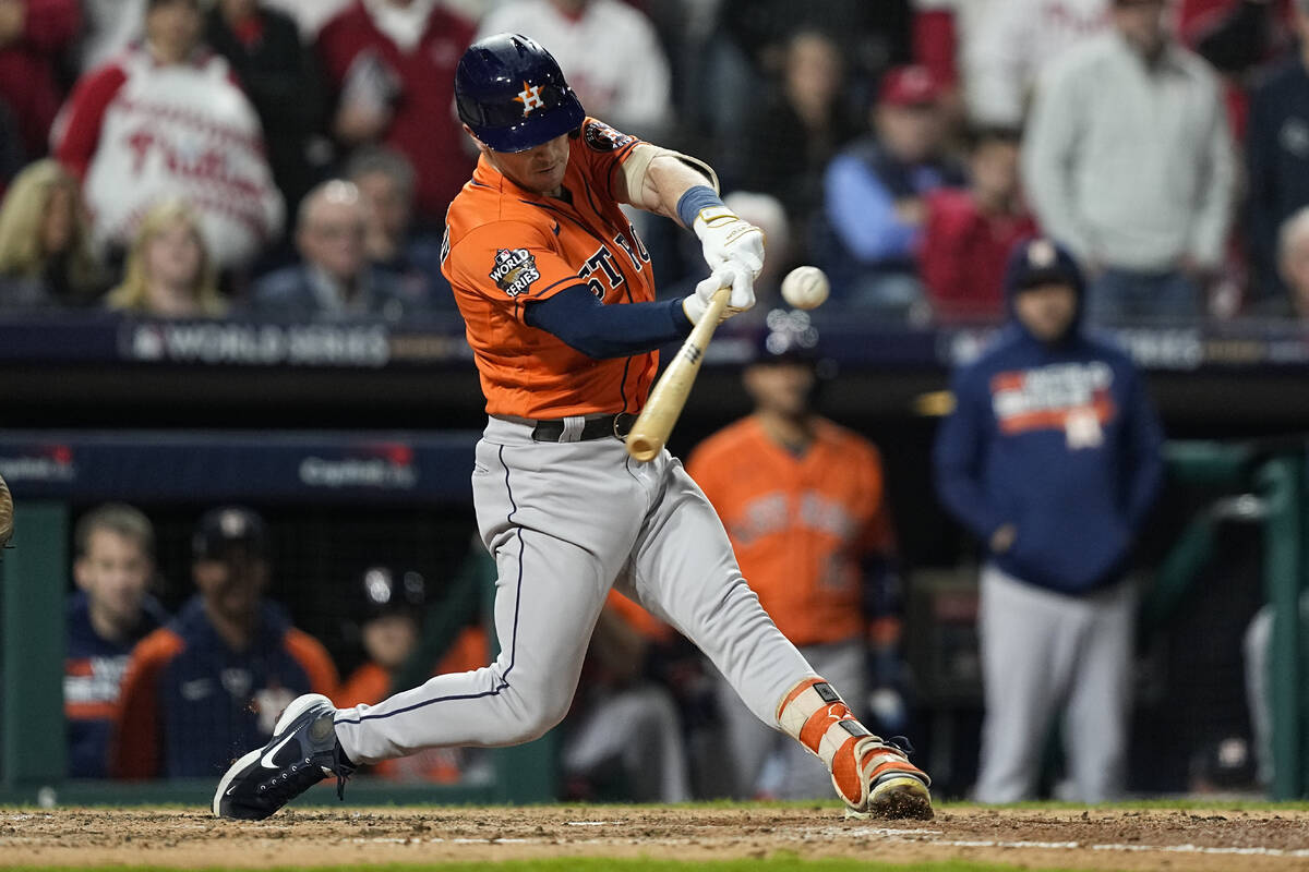 Houston Astros' Alex Bregman hits a two-RBI double during the fifth inning in Game 4 of basebal ...