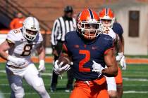 Illinois running back Chase Brown carries the ball during a NCAA college football game against ...