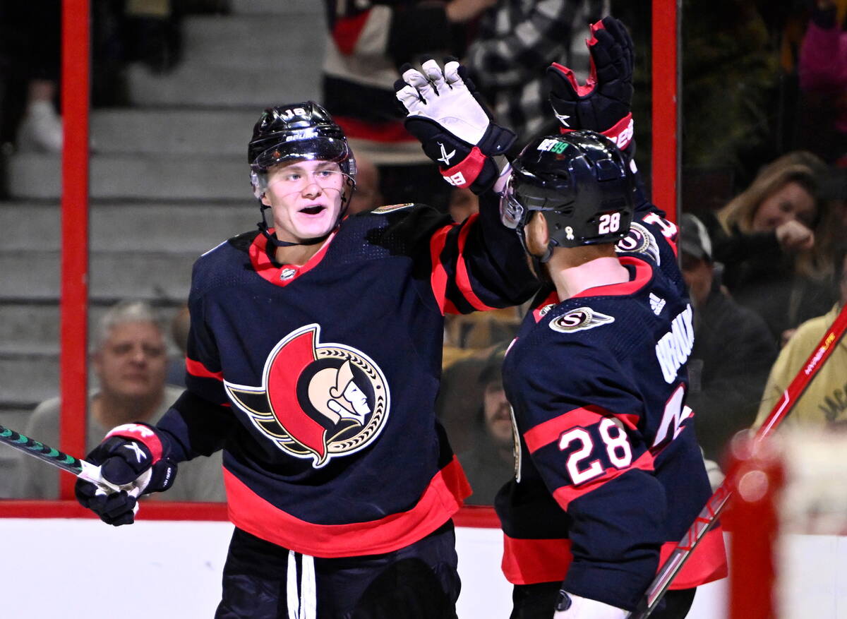 Ottawa Senators left wing Brady Tkachuk (7) celebrates a goal against the  Calgary Flames during second