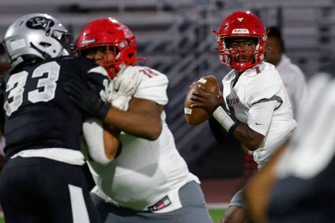 Arbor View’s quarterback Michael Kearns (7) looks to throw the ball during the first hal ...