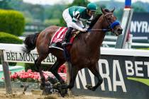 Flightline, jockey Flavien Prat up, wins The Hill 'N' Dale Metropolitan horse race before the 1 ...