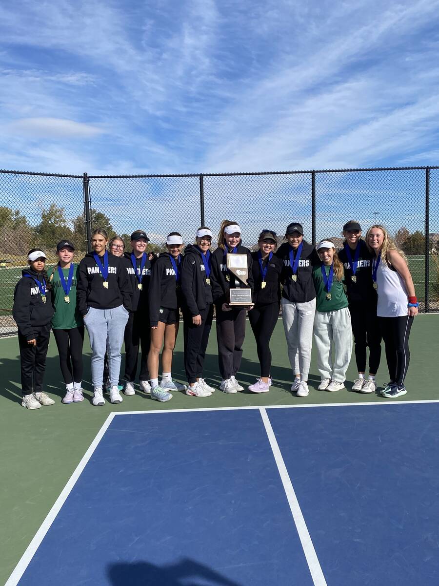 The Palo Verde girls tennis team poses with the Class 5A state championship trophy. (Tyler Marc ...