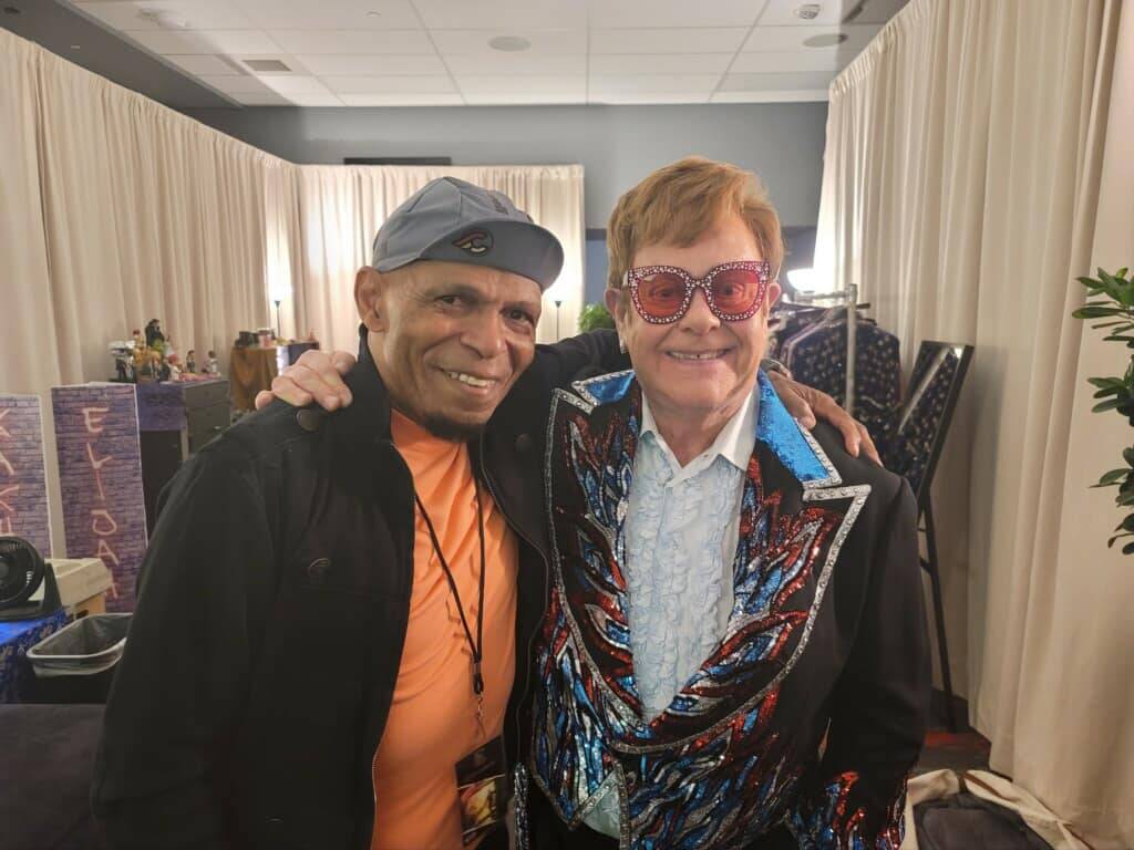 In a meeting of keyboard legends, Ronnie Foster hangs with Elton John before John's show at All ...