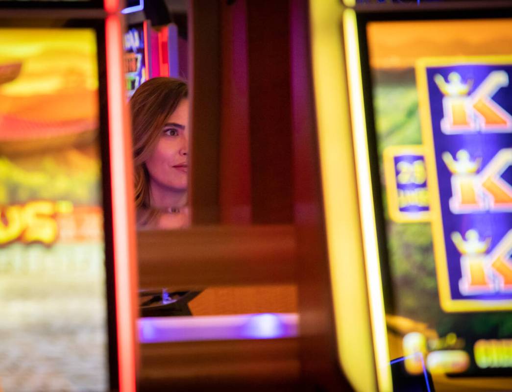 Francine Maric plays a high limit slot at the Venetian casino on Friday, Nov. 4, 2022. Maric ru ...