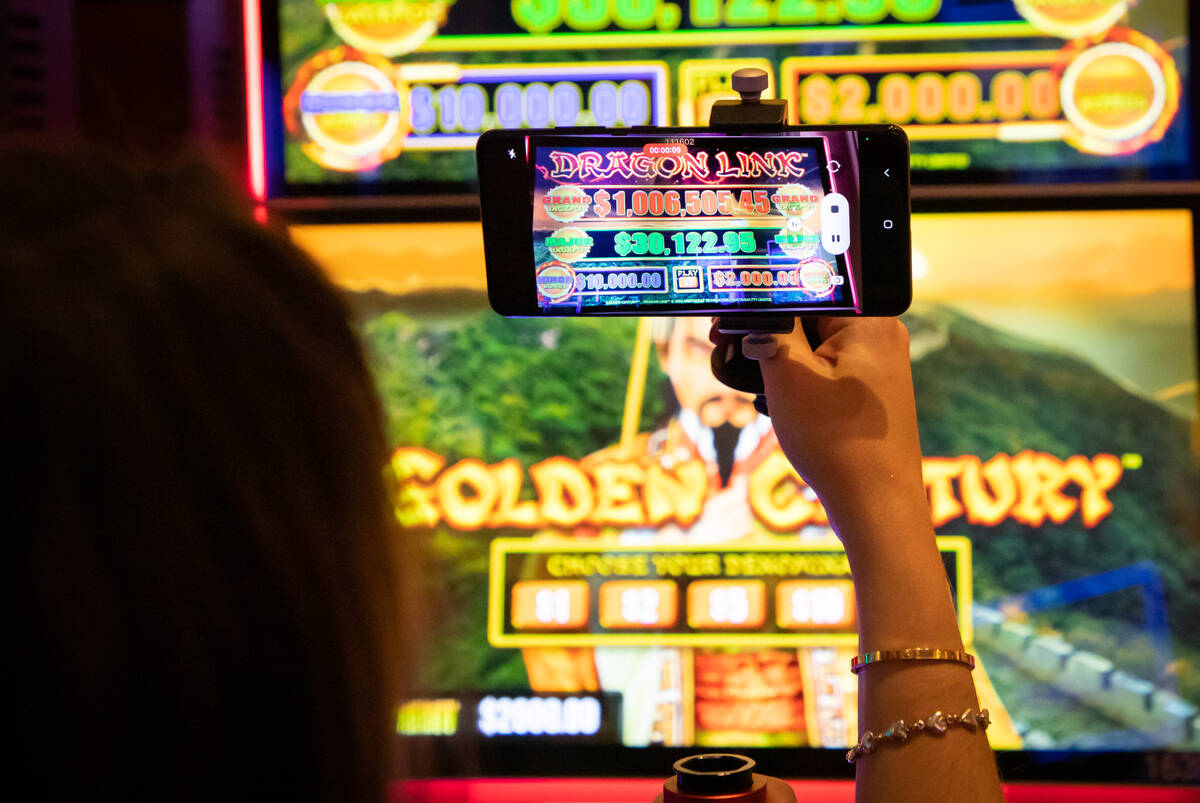 Francine Maric films video footage of herself playing a high limit slot at the Venetian on Frid ...
