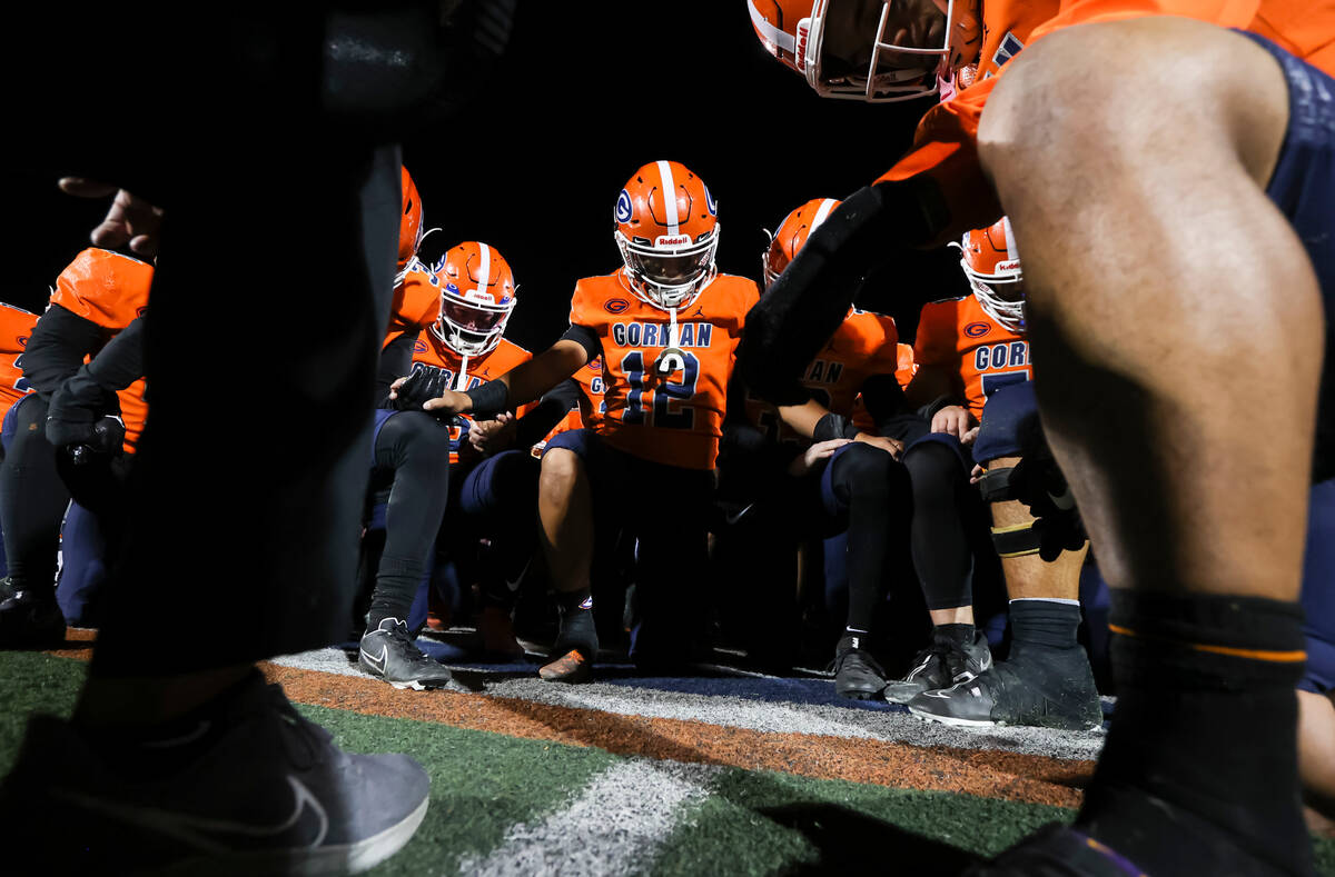 Bishop Gorman players gather after defeating Desert Pines inf a Class 5A playoff football game ...