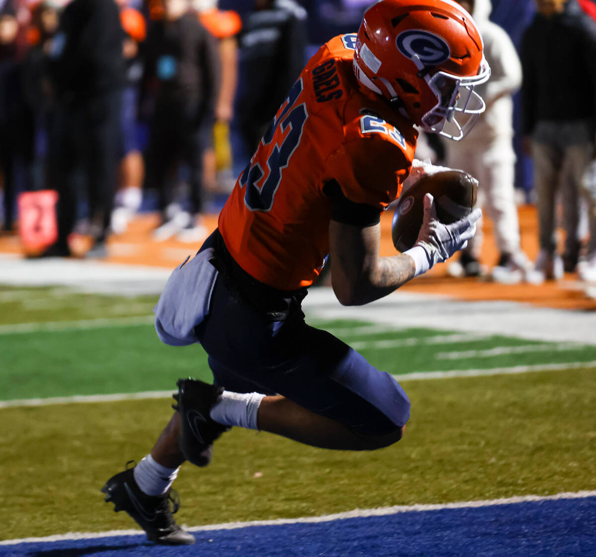 Bishop Gorman’s Trech Kekahuna (23) scores a touchdown against Desert Pines during the s ...