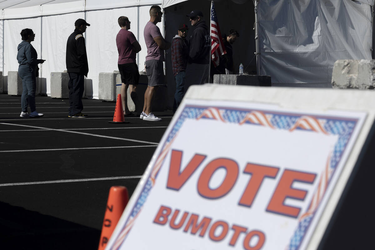 Voters wait in line on the last day to cast ballots early, Friday, Nov. 4, 2022, at Silverado R ...