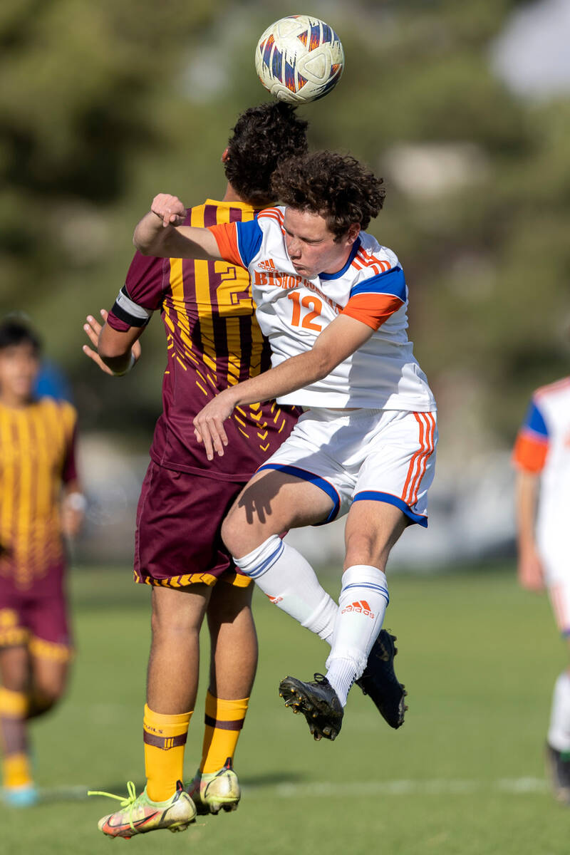 Bishop Gorman’s Zachary Fallon (12) heads the ball against Eldorado’s Angel Revel ...
