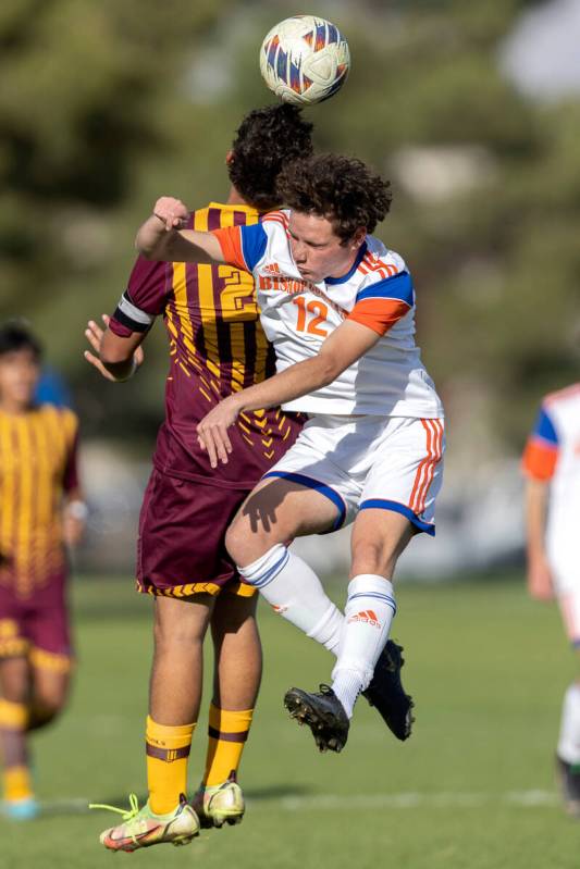 Bishop Gorman’s Zachary Fallon (12) heads the ball against Eldorado’s Angel Revel ...