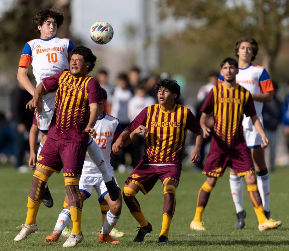 Eldorado’s Pedro Avilez, second from left, heads the ball against Bishop Gorman’s ...