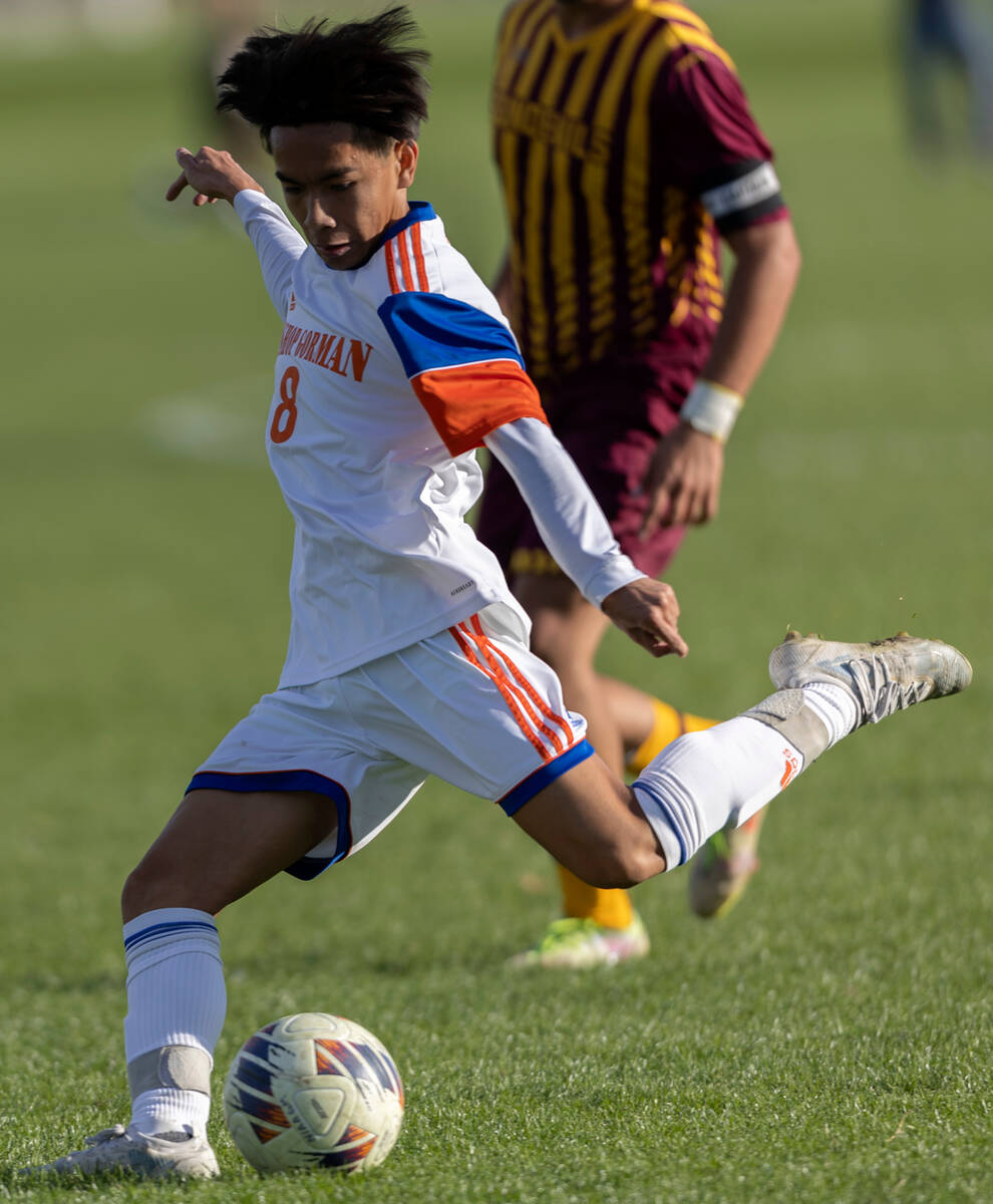 Bishop Gorman’s Edison Yuen (8) attempts a goal during the Class 5A boys soccer southern ...