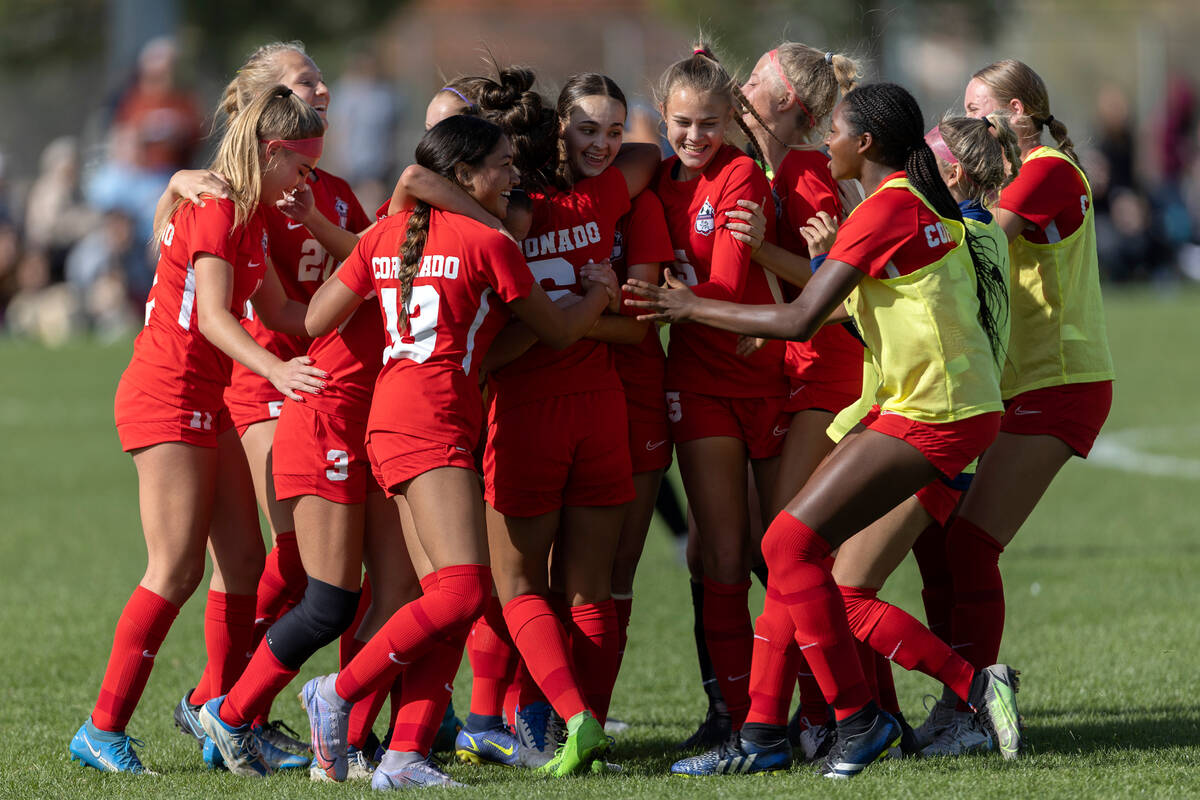 Coronado celebrates after winning the Class 5A girls soccer southern regional final game agains ...