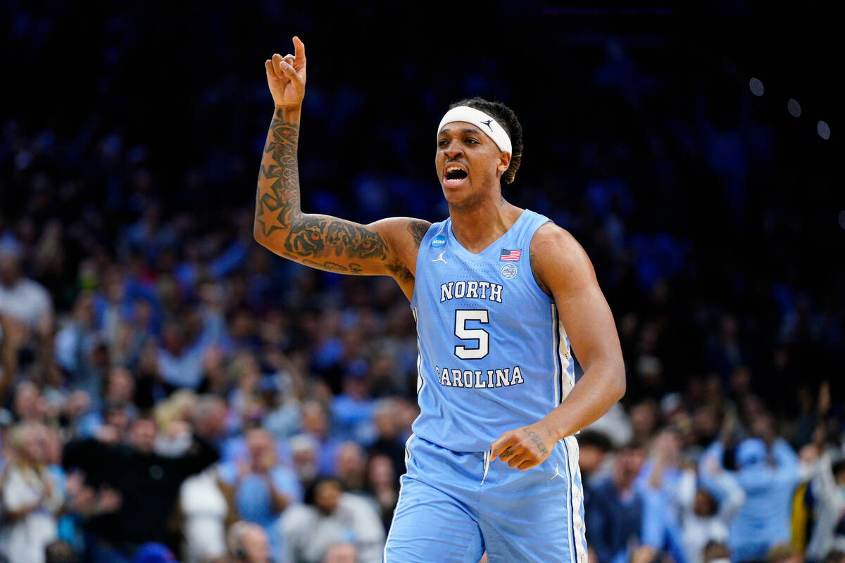 FILE - North Carolina's Armando Bacot reacts during the second half of the team's game against ...