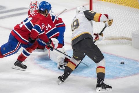 Vegas Golden Knights' Reilly Smith (19) scores against Montreal Canadiens goaltender Jake Allen ...