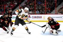 Vegas Golden Knights left wing William Carrier (28) shoots against Ottawa Senators goaltender A ...