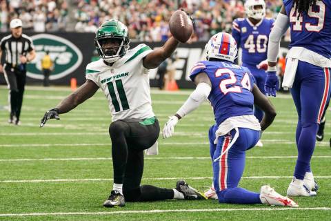 New York Jets wide receiver Denzel Mims (11) gestures after making a catch in front of Buffalo ...