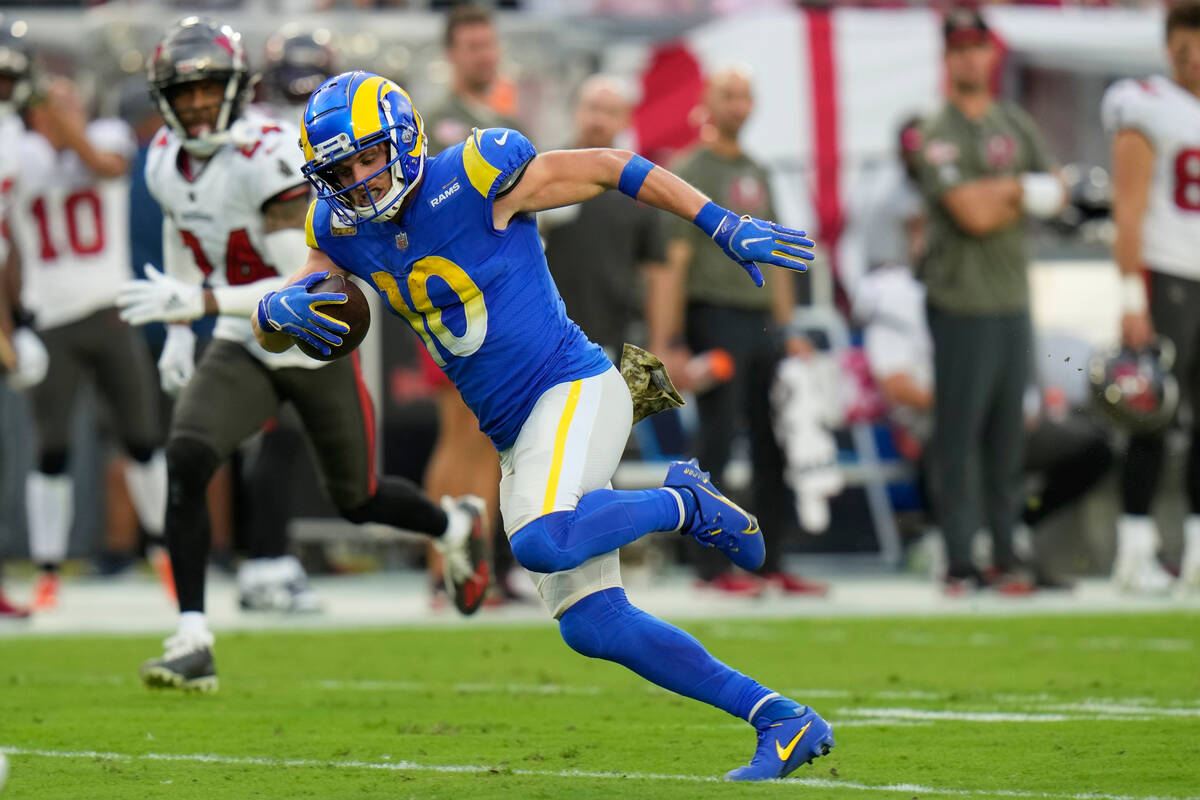 Los Angeles Rams wide receiver Cooper Kupp (10) runs to the end zone for a 69-yard touchdown re ...