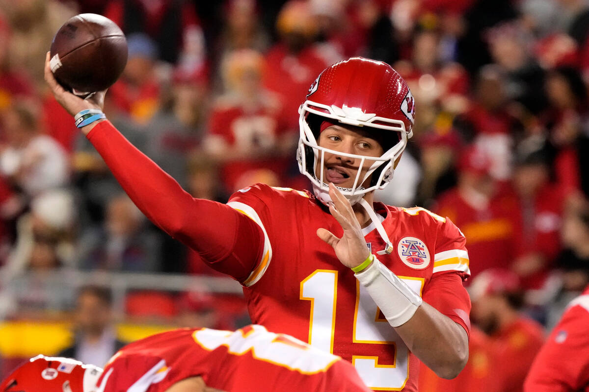 Kansas City Chiefs quarterback Patrick Mahomes warms up before the start of an NFL football gam ...