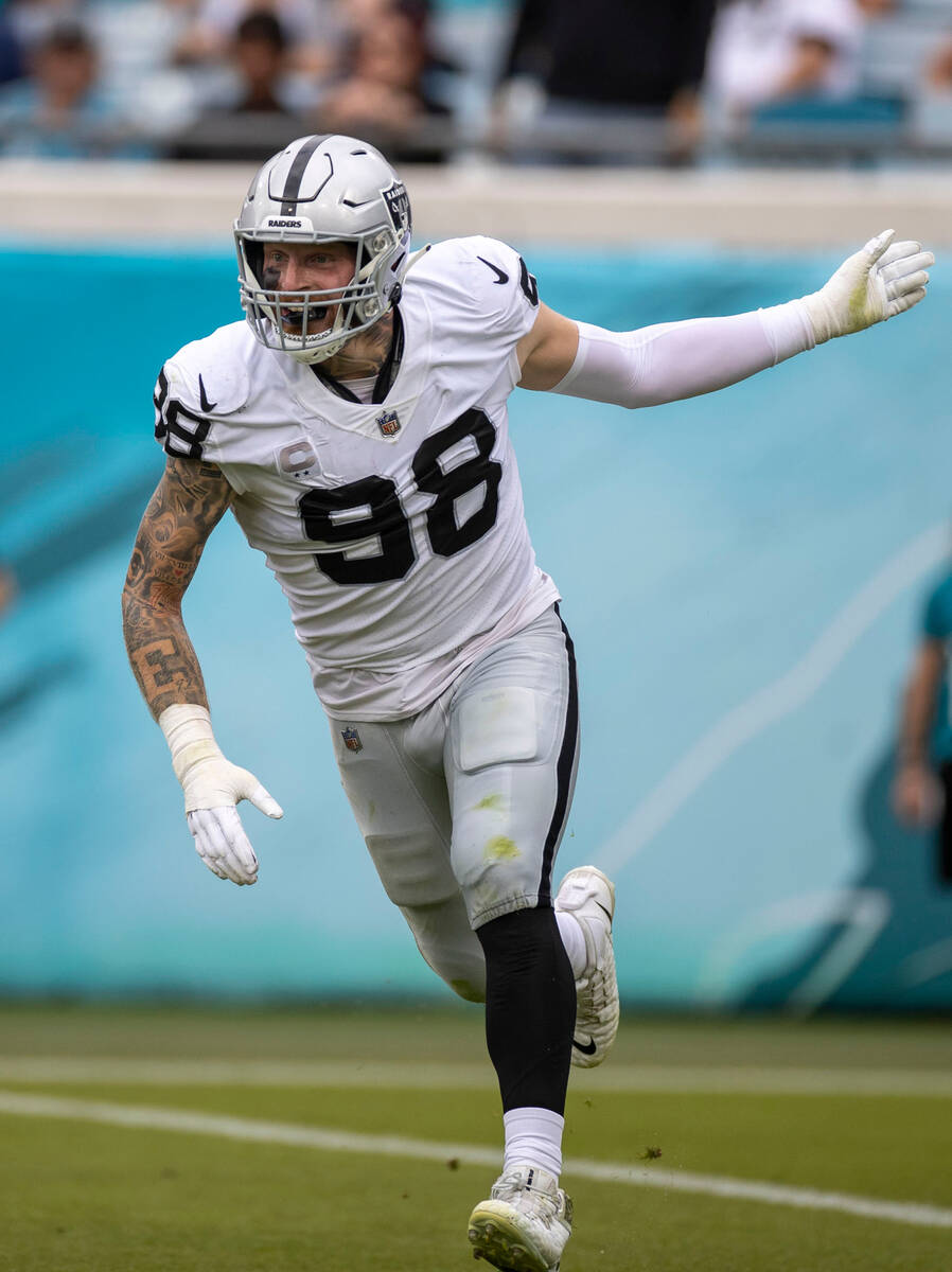 Raiders defensive end Maxx Crosby (98) celebrates a defensive stop during the first half of an ...