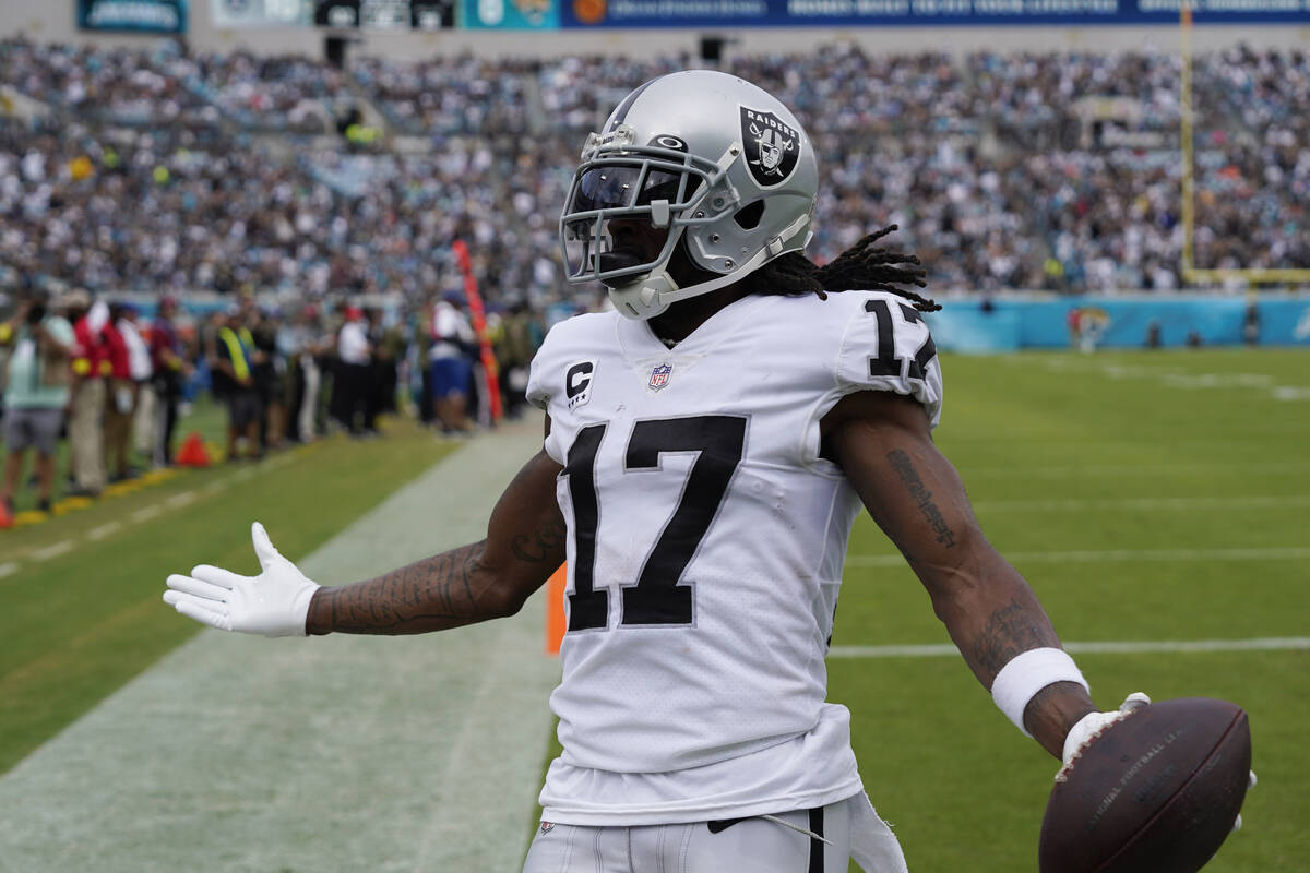 Las Vegas Raiders wide receiver Davante Adams (17) celebrates after scoring his second touchdow ...