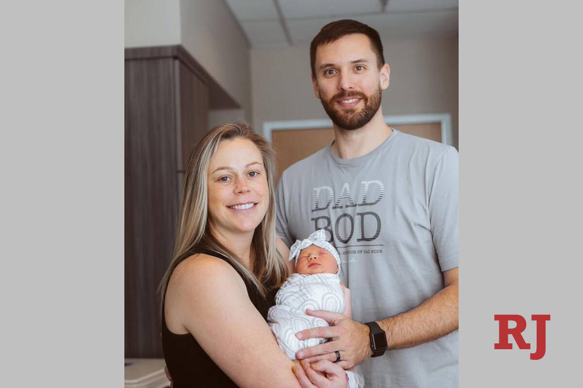 UNLV women's basketball coach Lindy La Rocque with husband Dan Cunningham and newborn daughter ...