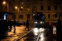 A tram arrives at a tram stop during a blackout in Kyiv, Ukraine, Sunday, Nov. 6, 2022. (AP Pho ...