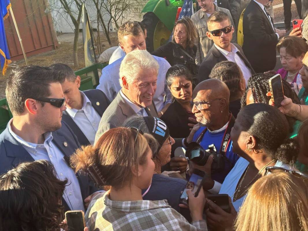 Former President Bill Clinton mingles with the crowd at a rally for Nevada Sen. Catherine Corte ...