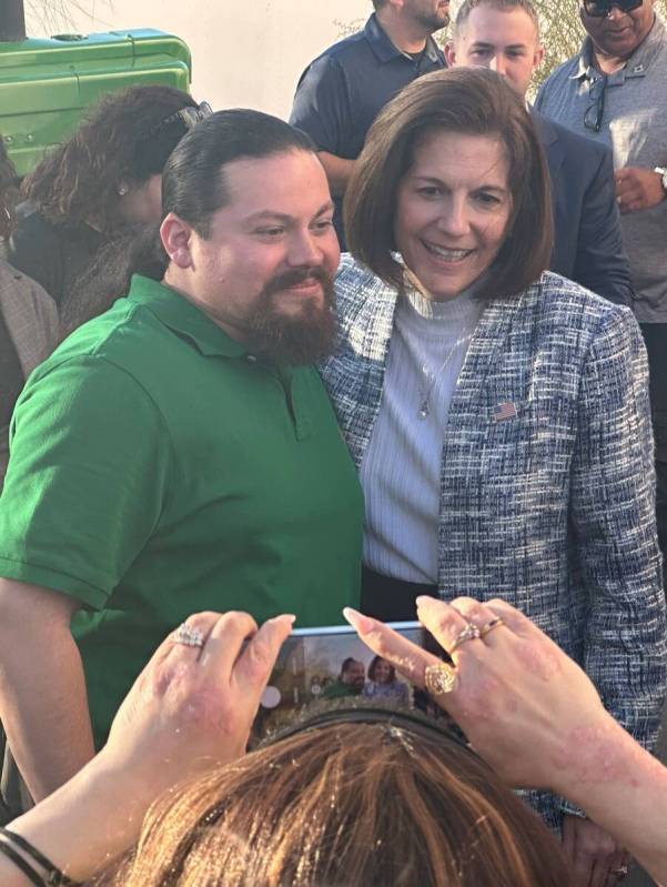 Marino Montenegro Jr., 34, poses for a photo with Nevada Sen. Catherine Cortez Masto on Nov. 6, ...