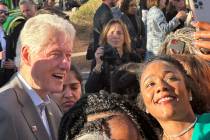 Andrea Dudley, 45, takes a photo with former President Bill Clinton in Henderson, Nevada, on No ...