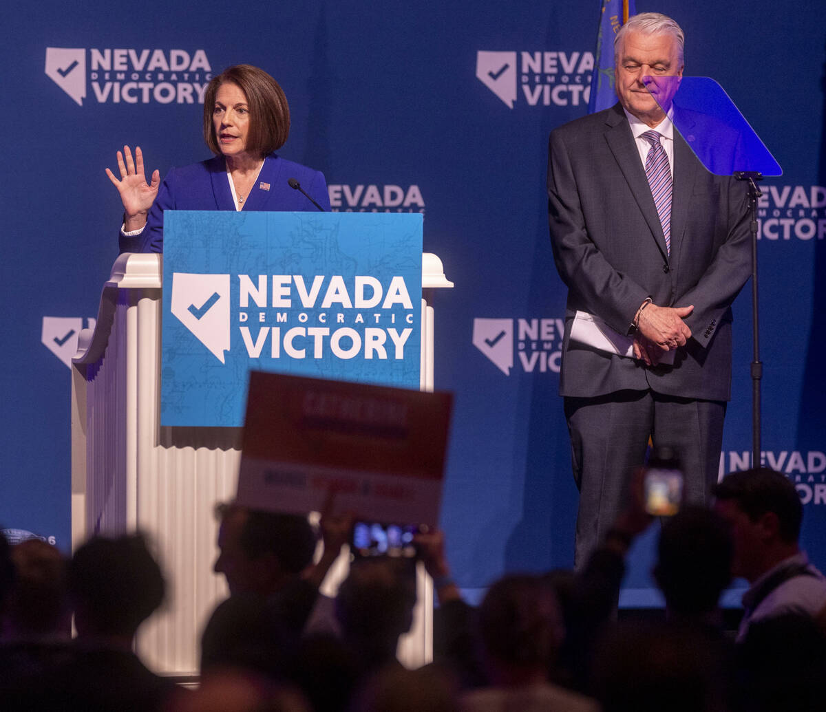 Senator Catherine Cortez Masto and Governor Steve Sisolak greet supporters before speaking duri ...