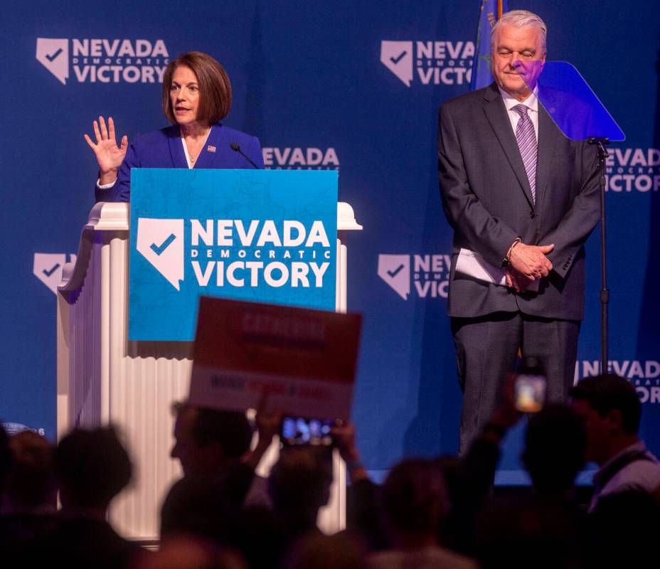 Senator Catherine Cortez Masto and Governor Steve Sisolak greet supporters before speaking duri ...